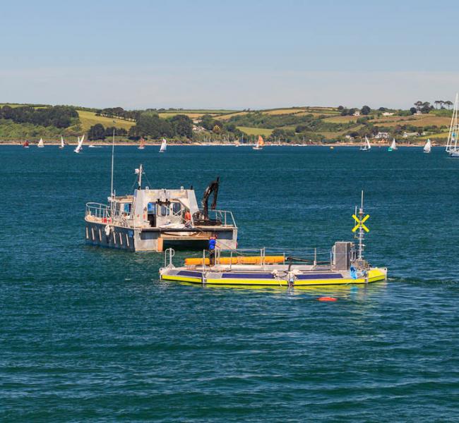 Seatricity Oceanus 2 Under Tow in Falmouth Harbour