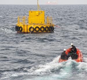 European Marine Energy Centre (EMEC) Deployment of EMEC test support buoy at scale wave site (Credit Mike Brookes-Roper)