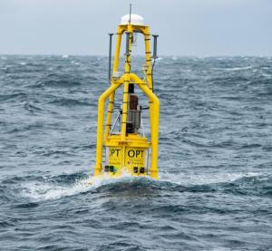 Yellow PowerBuoy with the buoy portion underwater in action