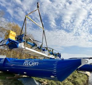 ORPC RivGen® turbine, generator, chassis lowered onto pontoons during assembly, Winnipeg River, Manitoba, Canada CREDIT ORPC